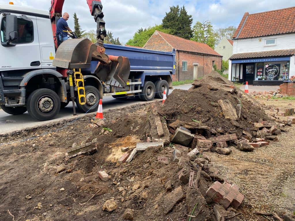 This is a photo of a dig out being carried out for the installation of a new tarmac driveway. Works being carried out by Rye Driveways