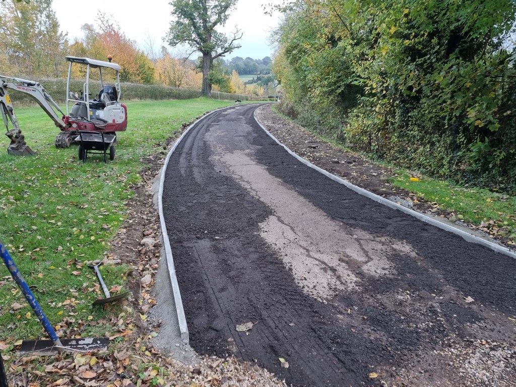 This is a large driveway which is in the process of having a tar and chip driveway installed on by Rye Driveways